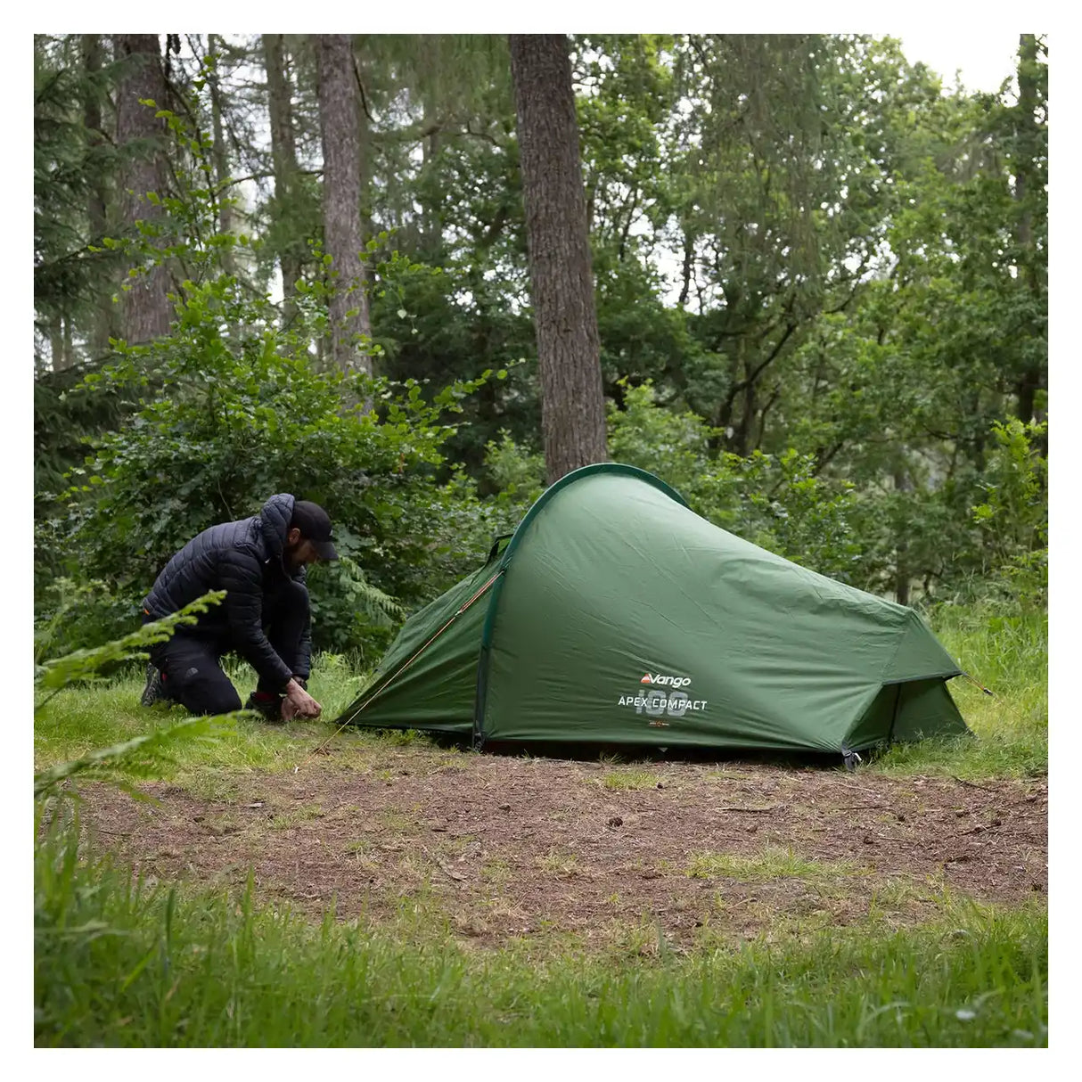 Pitching the Vango Apex Compact 100 tent at a woodland camp