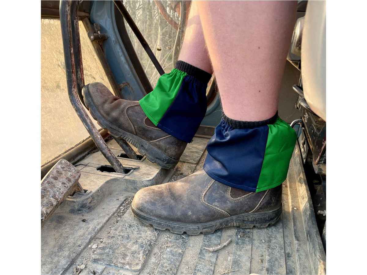 Navy and emerald green harlequin sox savers worn over work boots