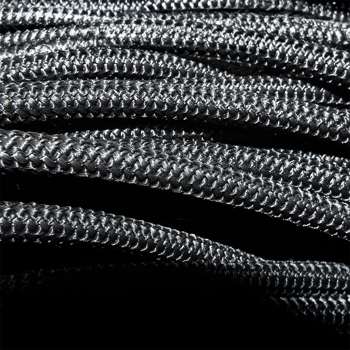 Close-up of the braided sheath of the bungee rope in the Green S-Grade Tarpaulin with 10m of 6mm Bungee Rope