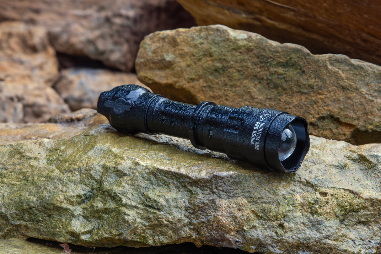 Nightfox XB5 Pro Infrared LED Torch 850nm - wet on a rock, IPX-6 splashproof