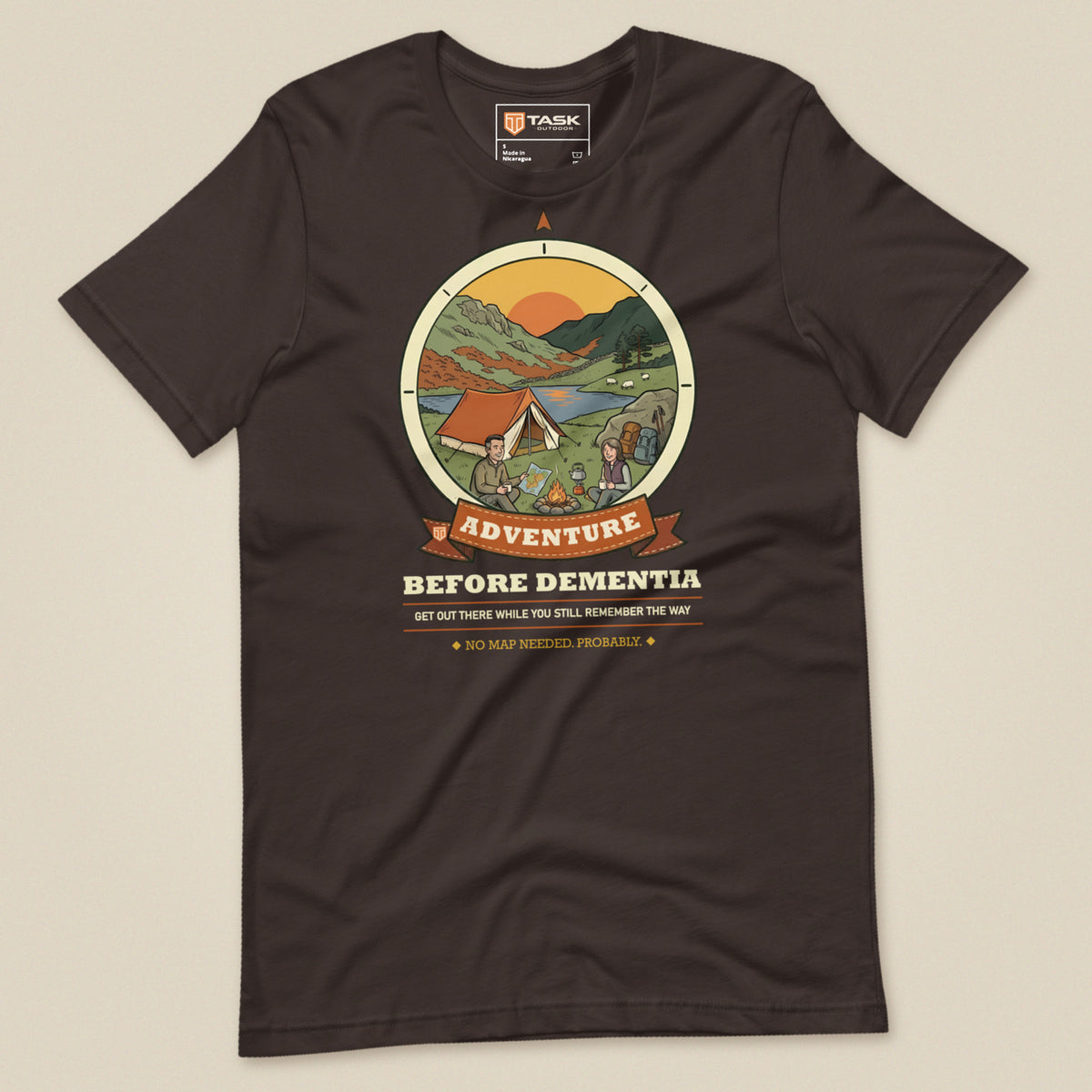 Adventure Before Dementia Camping T-Shirt in Brown, laid flat, front view