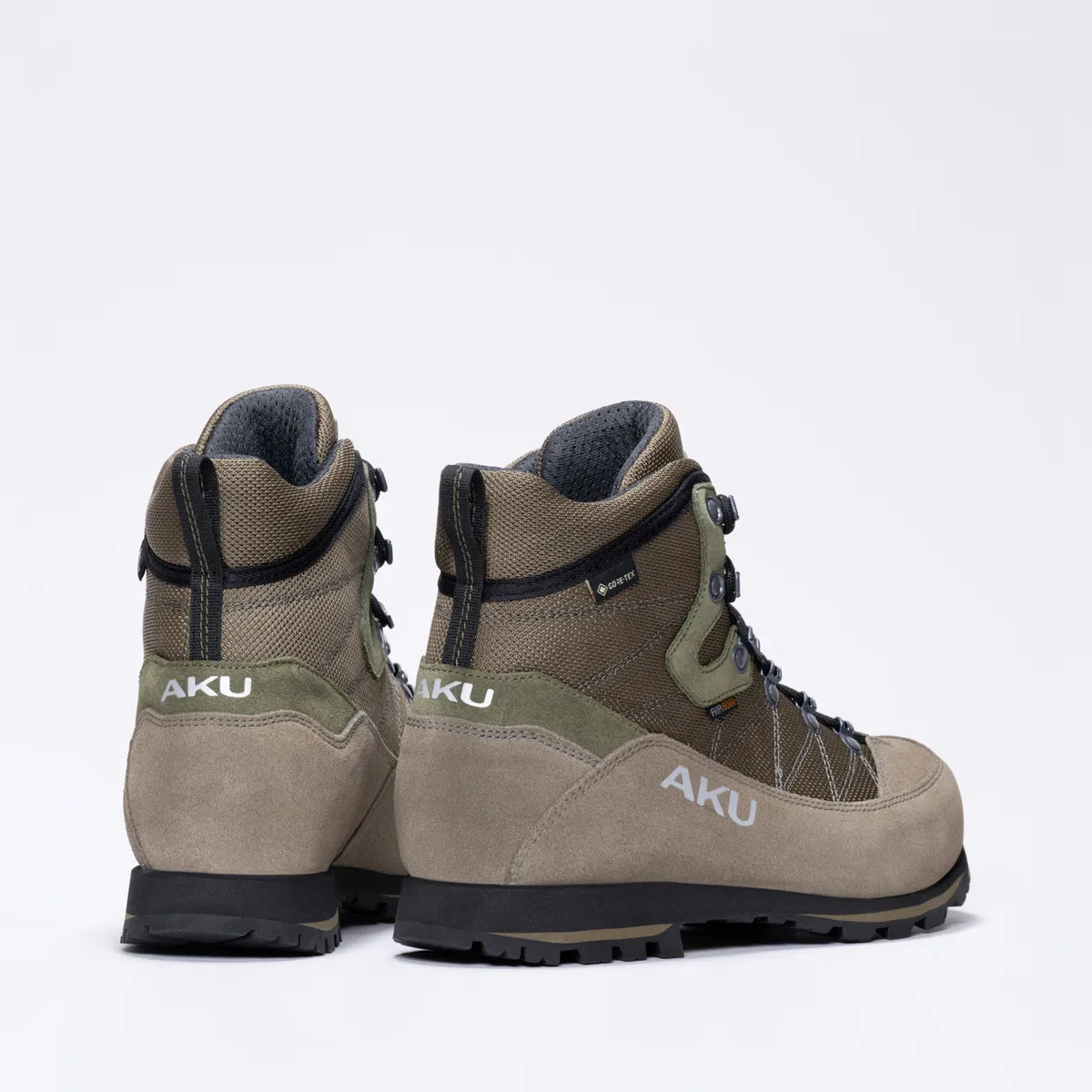 Pair of AKU Trekker Lite III Wide GTX boots in brown/green from behind, showing the heel pull loops and padded collars