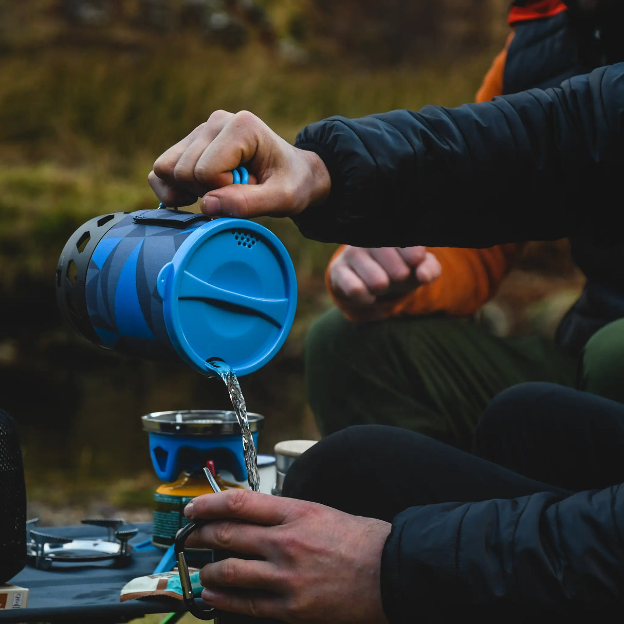 Highlander Blade Fastboil 3 Camping Gas Stove 1.1L in blue lifestyle for camping