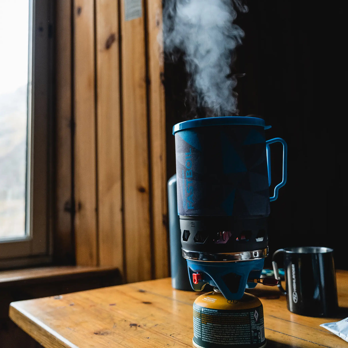 Highlander Blade Fastboil 3 Camping Gas Stove 1.1L in blue lifestyle for camping