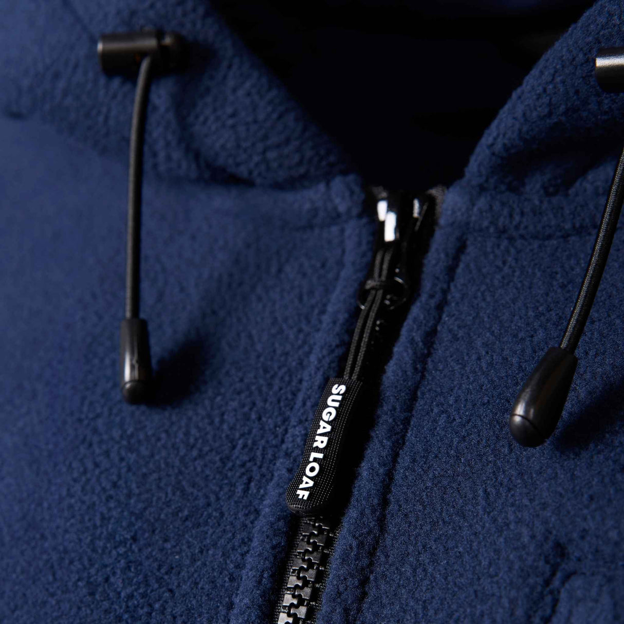 Sugar Loaf Dawnbreaker Polar Fleece Hoodie in Navy Blue close up of zip