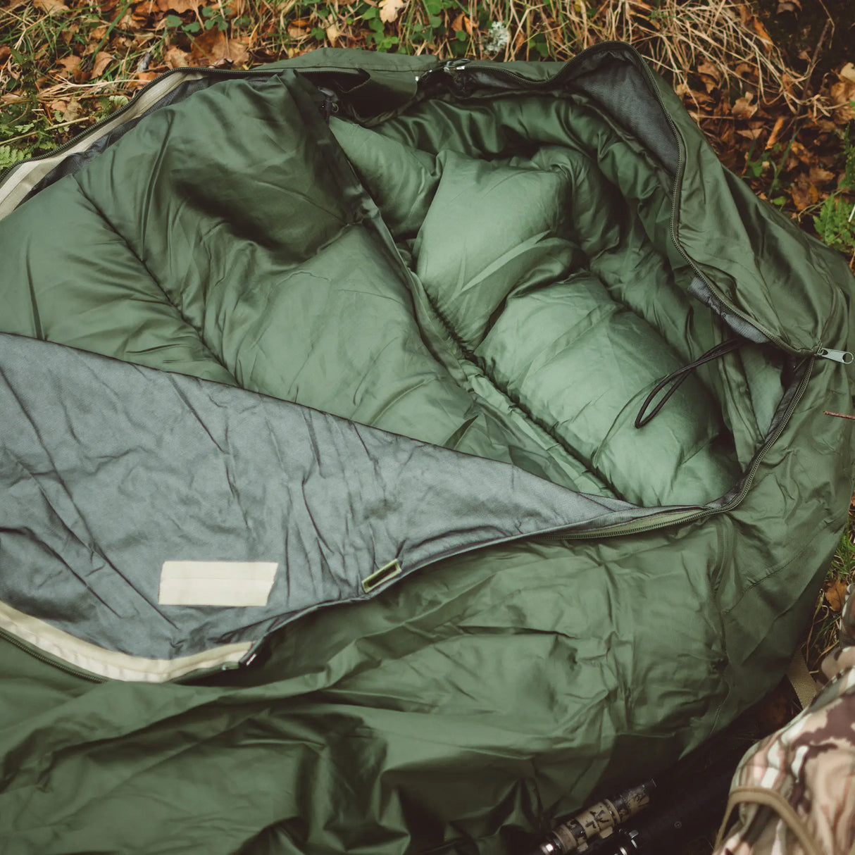 Highlander Hawk Waterproof Bivvy Bag being used outdoors - for camping