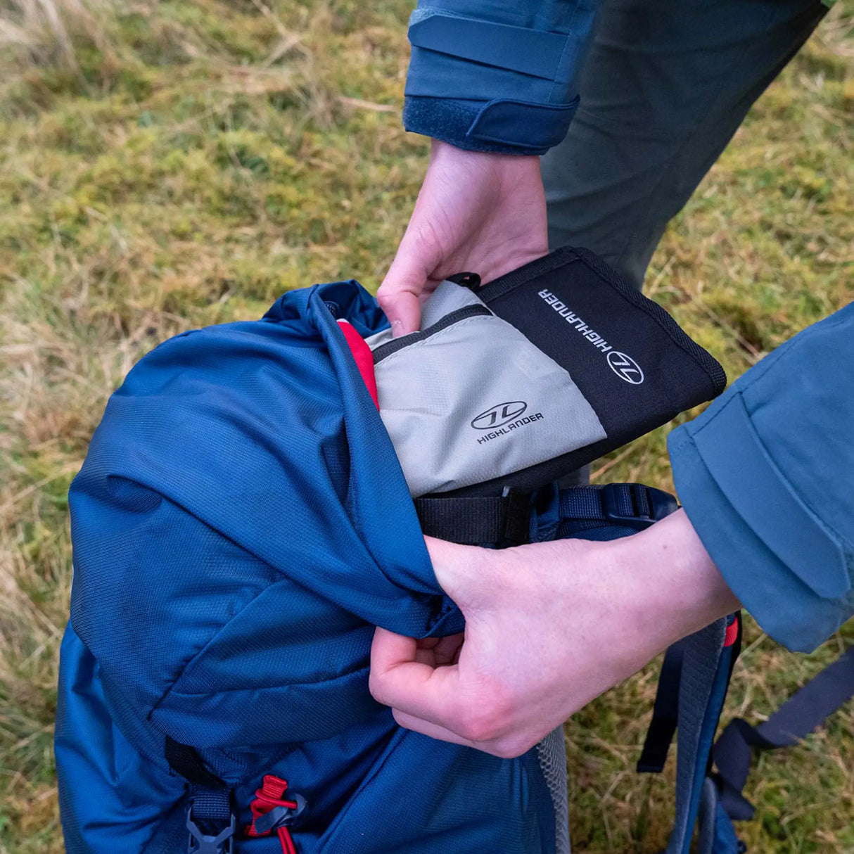 Highlander Ivar Men's Rucksack 50L - Navy Blue packing kit into the lid pocket