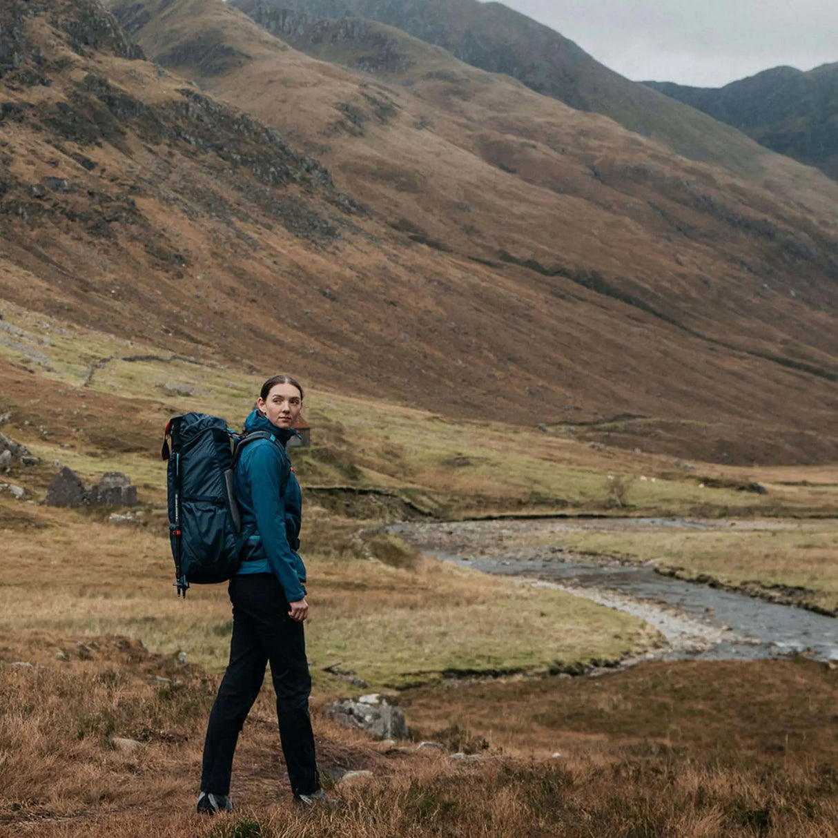 Highlander Ivar Women's Rucksack 50L - Navy Blue worn by hiker in a Highland glen