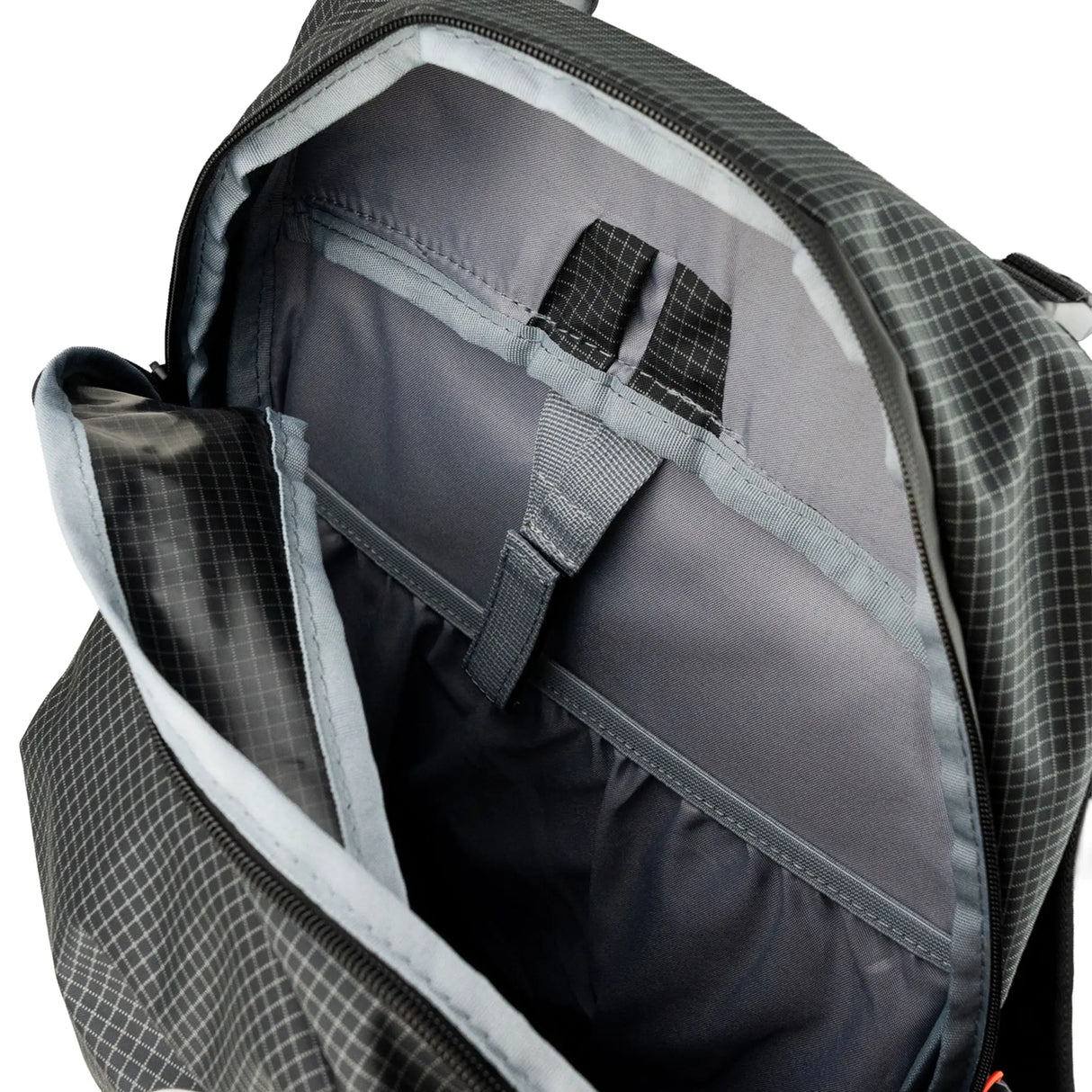 Highlander Kynetik Rucksack 25L in Black - main compartment unzipped showing the grey lining and internal sleeve