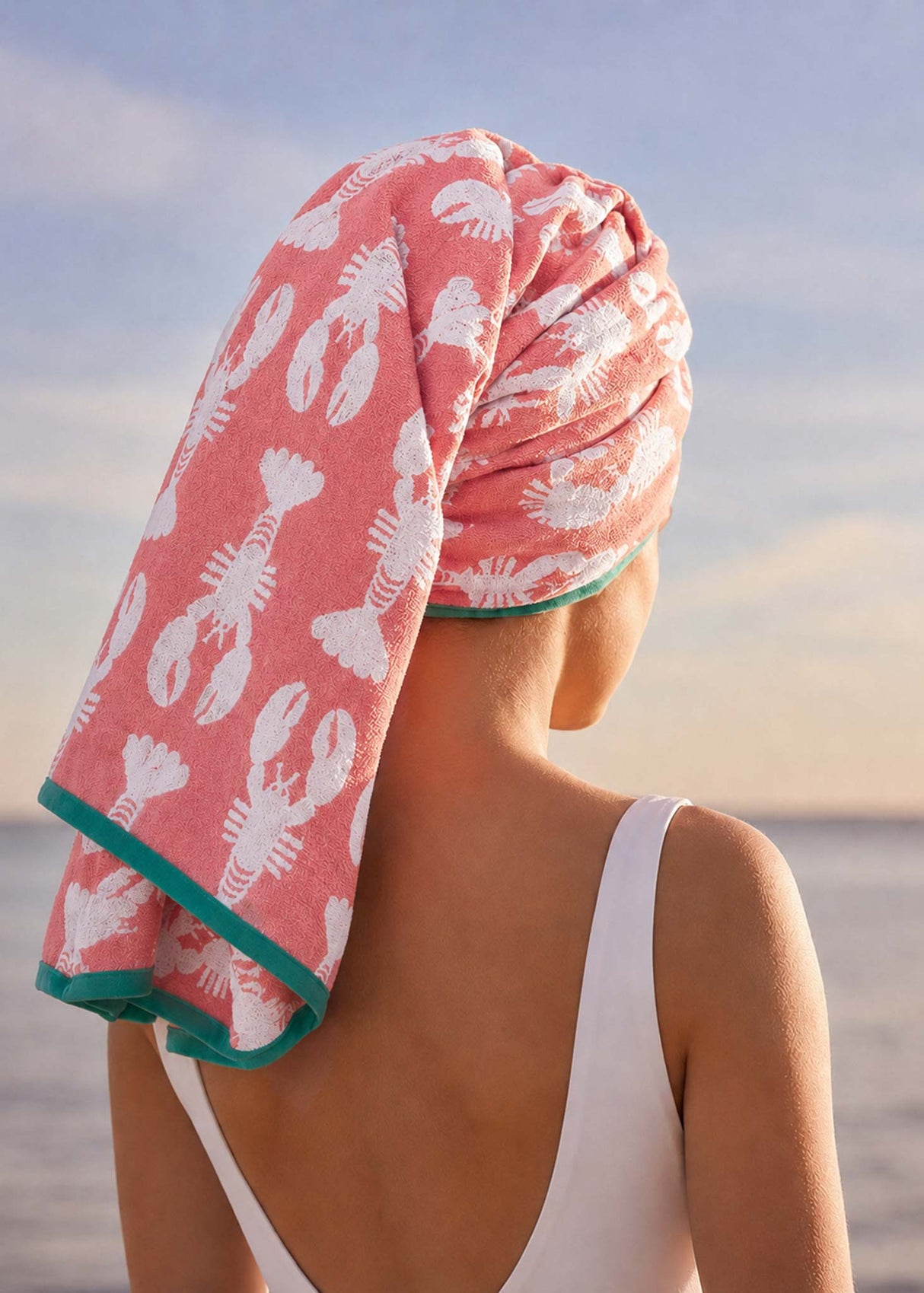 Anorak Lobsters Pink Organic Cotton Towel - Soft pink and white worn as a hair wrap