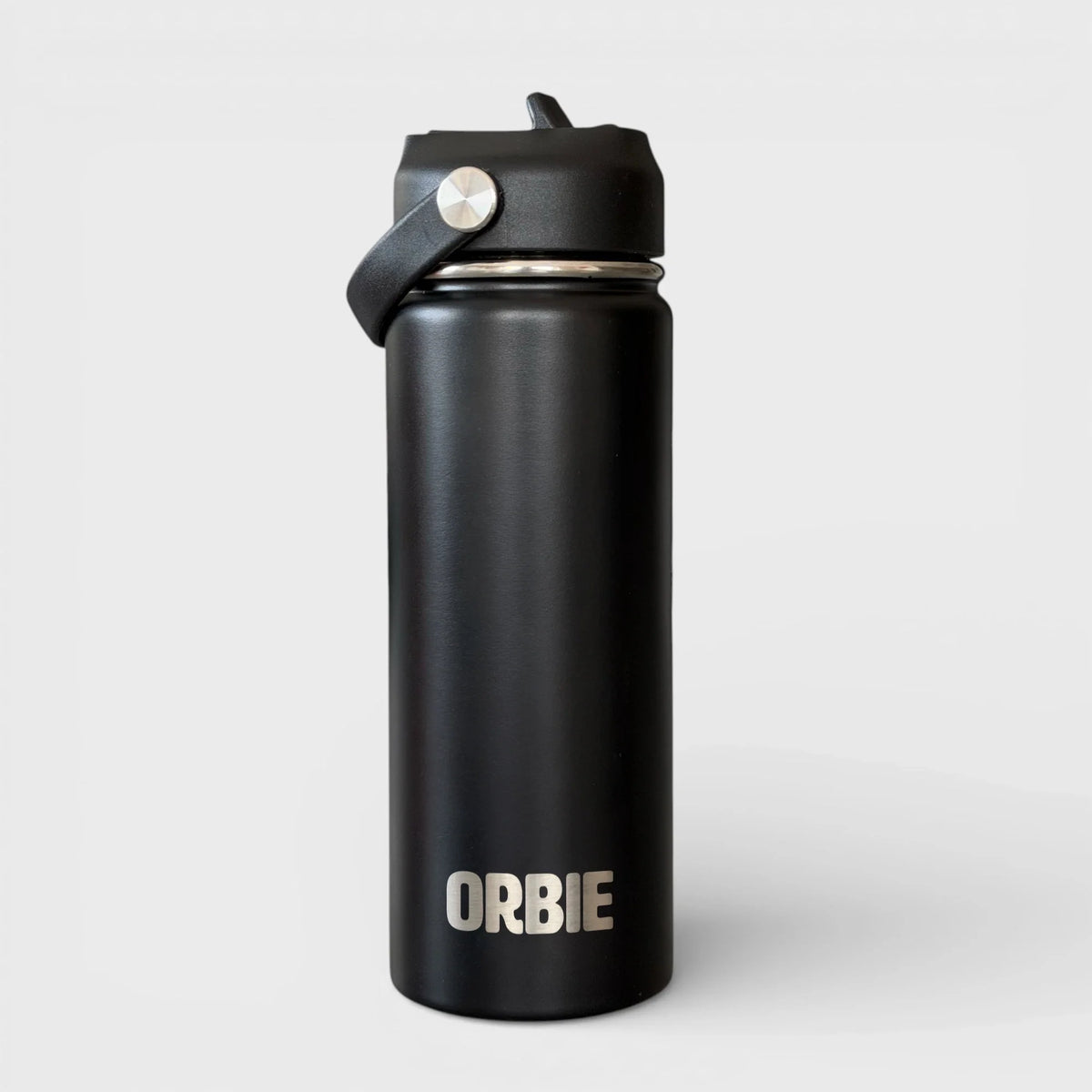 Black Orbie 18oz insulated bottle with the low-profile sip lid fitted