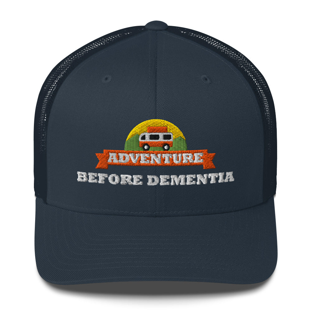 Adventure Before Dementia Trucker Cap in Navy, front view of the embroidered badge