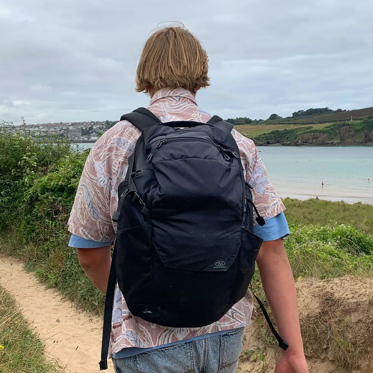 Highlander Roam Backpack 28L being worn while hiking outdoors