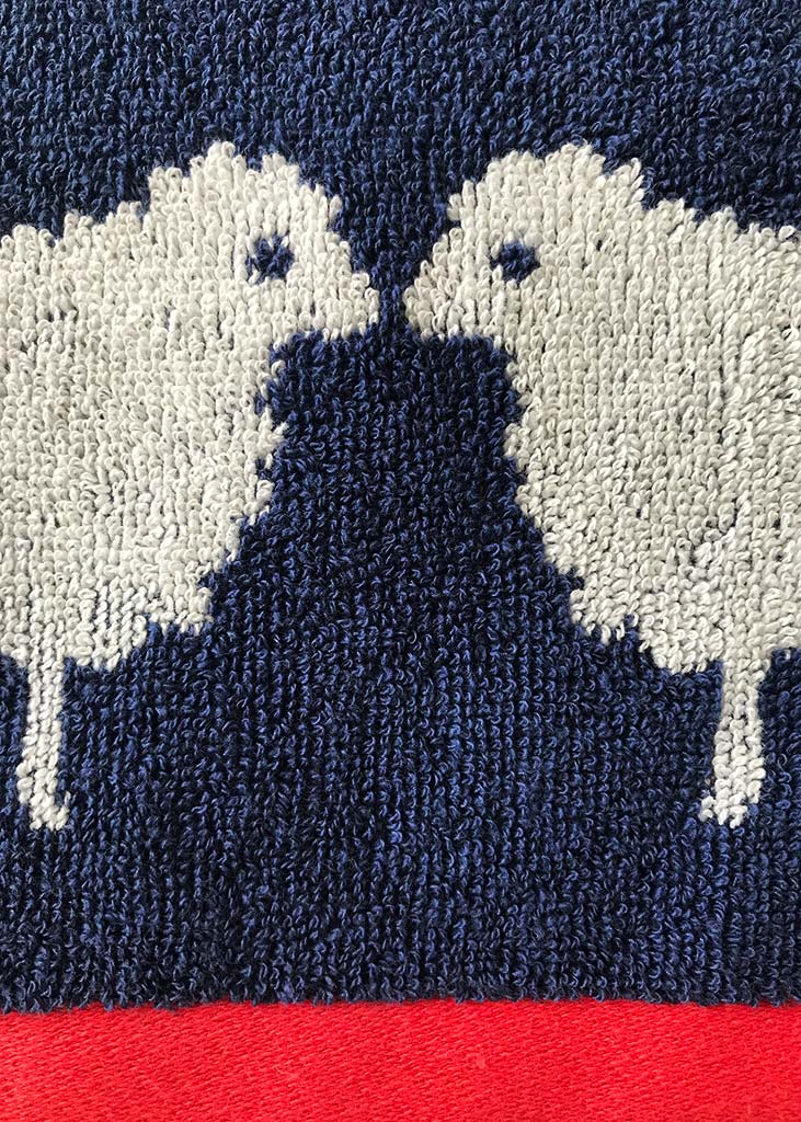 Anorak Kissing Sheep Organic Cotton Towel - Navy blue and white jacquard weave close up