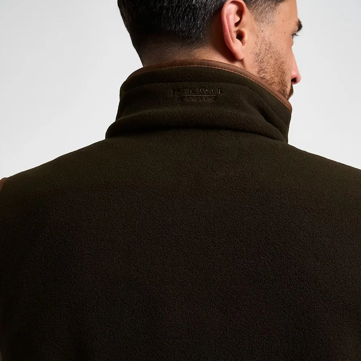 Jack Pyke Shooters Fleece Gilet in dark olive close up of collar