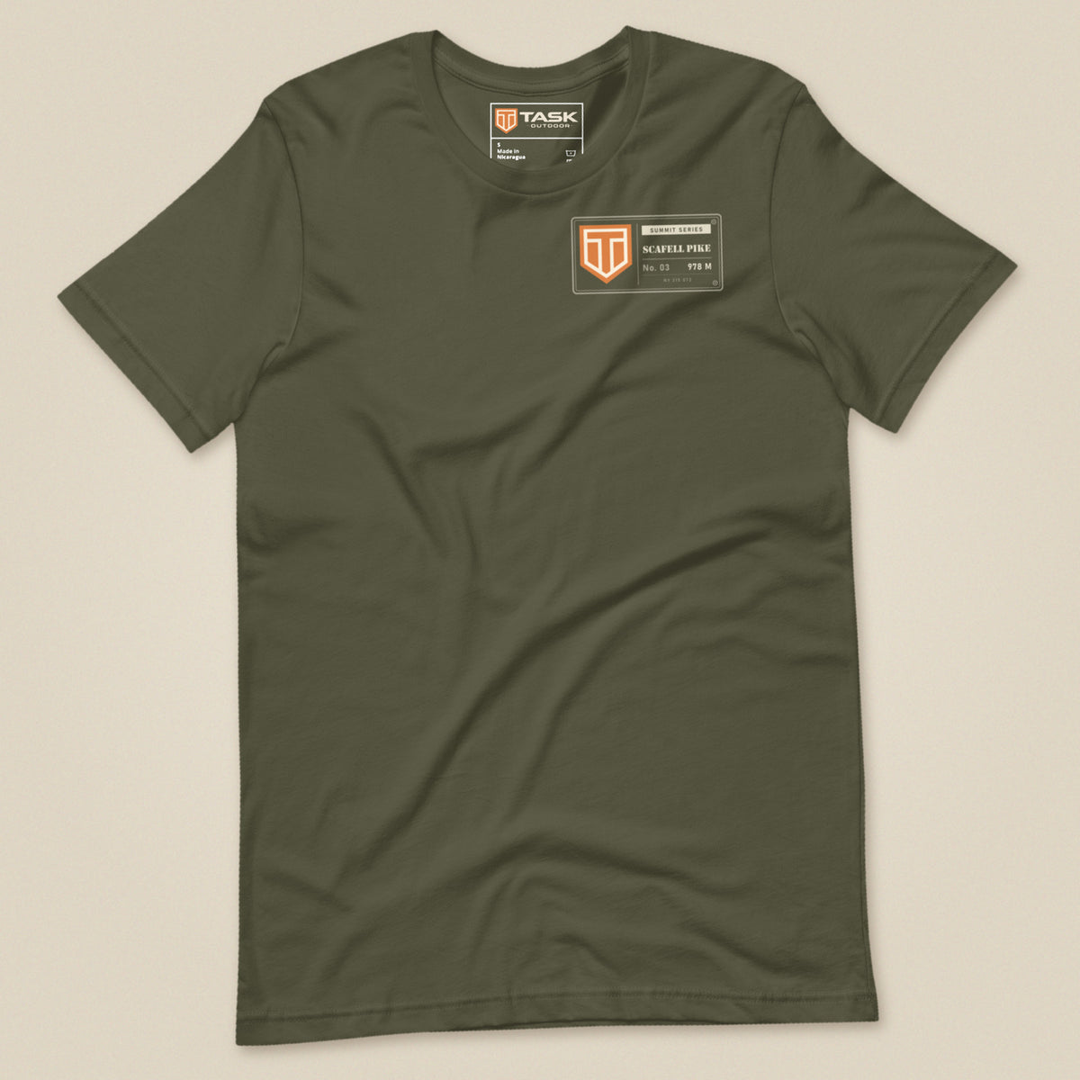 Summit Series Scafell Pike T-Shirt in Military Green, laid flat, front view with the left-chest badge