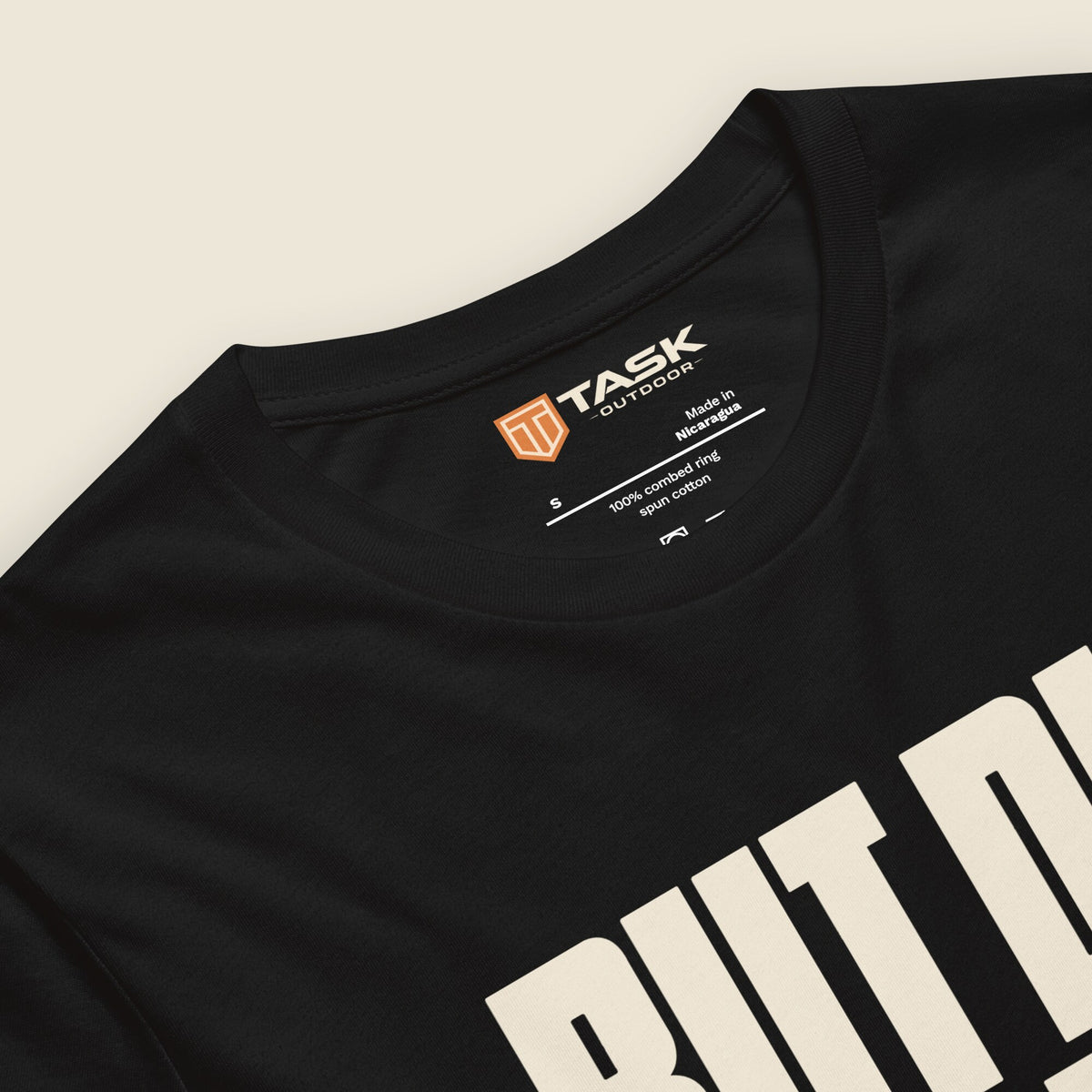 But Did You Die? Unisex T-Shirt in Black, neck label close-up