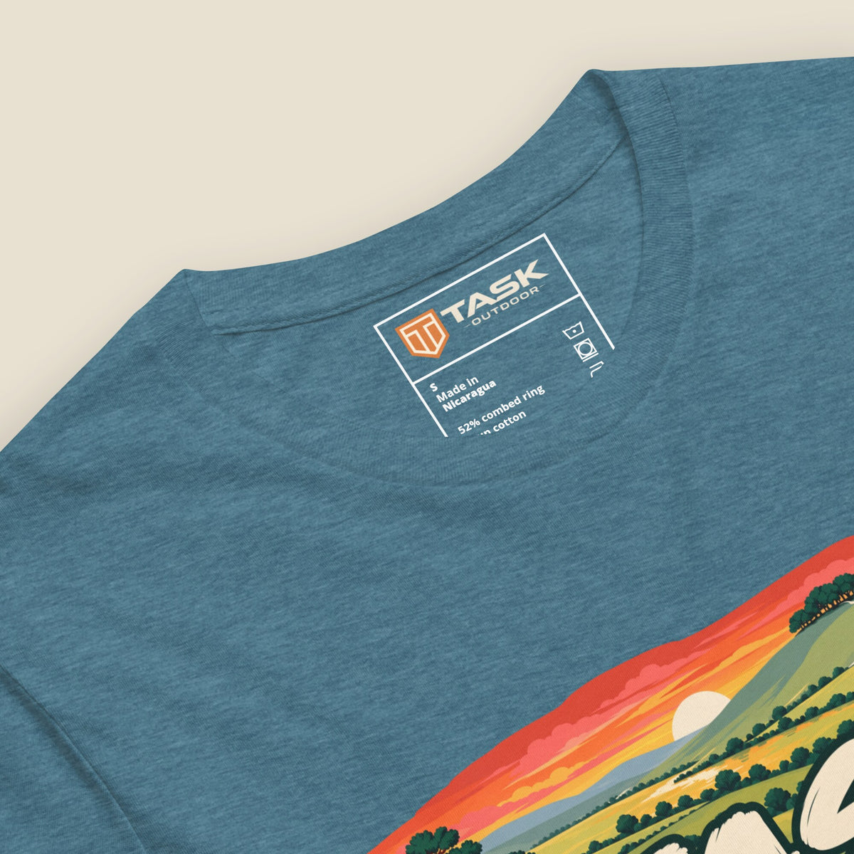 Hampshire Sunset Front Print Unisex T-Shirt, close-up of the printed Task Outdoor neck label