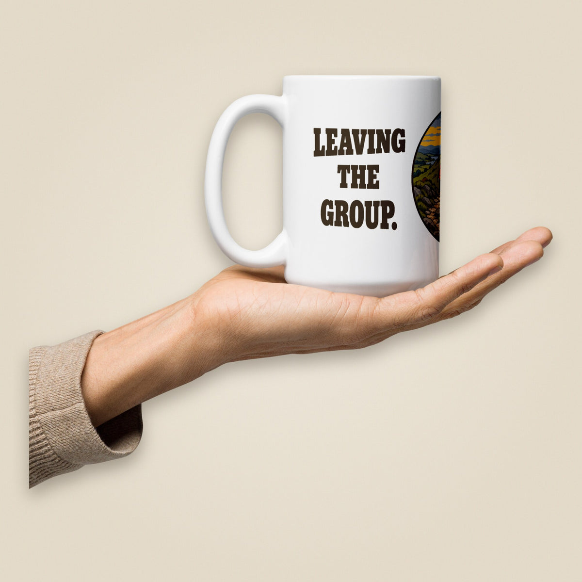 Leaving The Group White Glossy Ceramic Mug in 15 oz, held in hand, handle on left