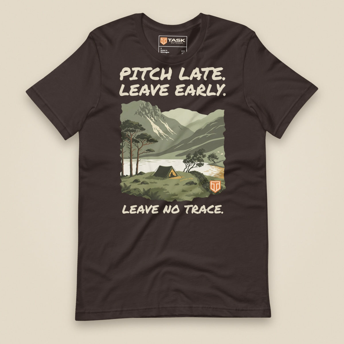 Pitch Late Leave Early T-Shirt in Brown, laid flat, front view