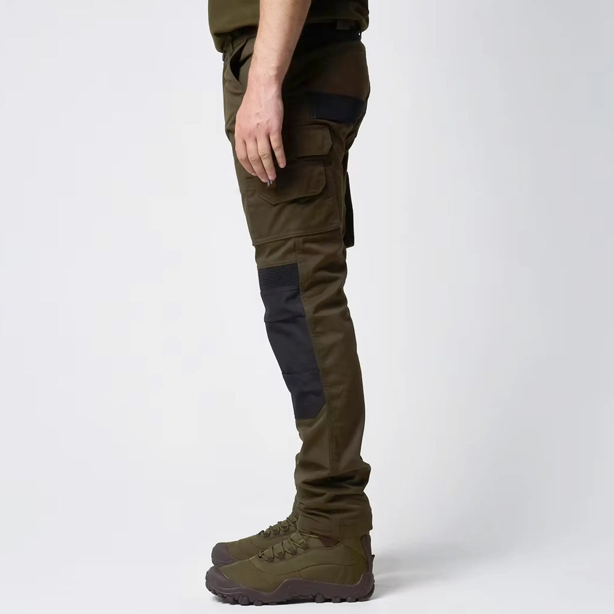 Jack Pyke Technical Work Trousers in green from the side on white background