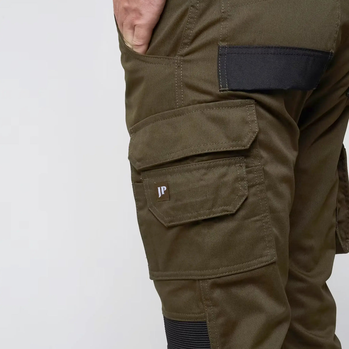 Jack Pyke Technical Work Trousers in green close up of cargo leg pocket