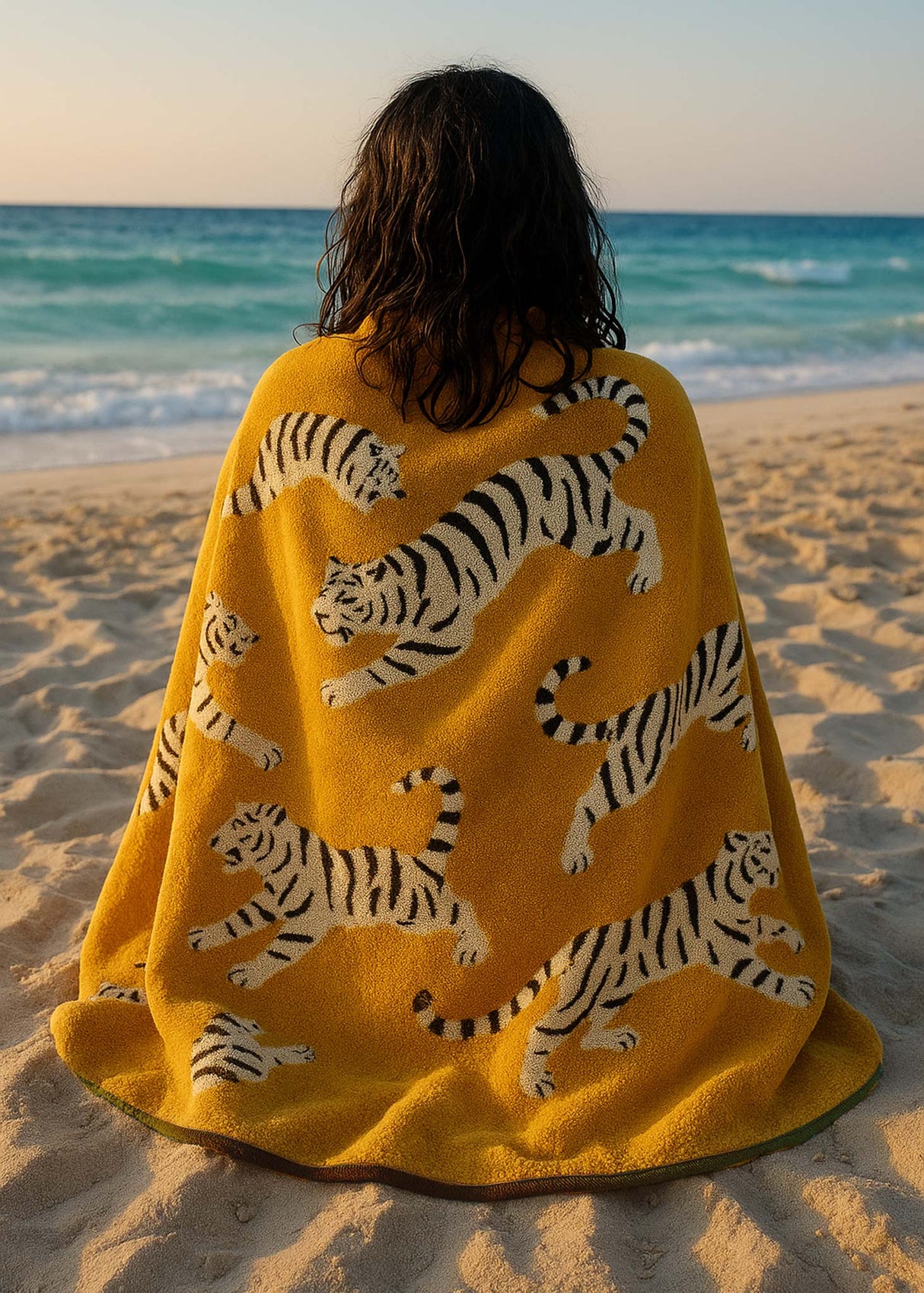 Anorak Tigers Organic Cotton Towel - Ochre and black bath sheet on the beach