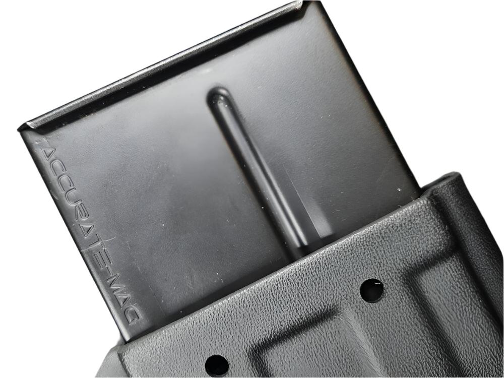 AICS .308 Magazine Carrier in black holding an Accuracy International pattern magazine, close up