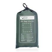 DD Tarp 3.5x3.5 in olive green packed in its drawcord stuff sack with spec label, on a white background