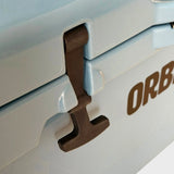 Close-up of a rubber T-latch on the Orbie 35 cool box, hooked over its moulded lug