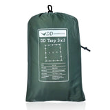DD Tarp 3x3m in olive green packed in its drawcord stuff sack with spec label, on a white background