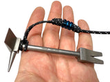 4 in Titanium Hooligan Bar and paracord lanyard across an open palm to show its size