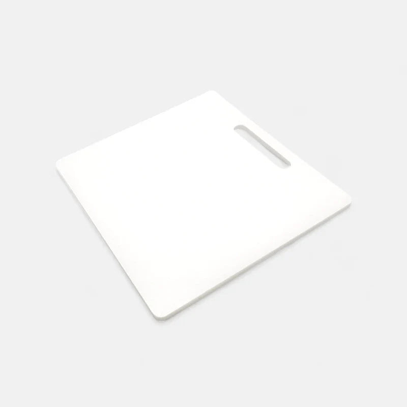 White divider supplied with the Orbie 55 cool box, with a cut-out handle, doubling as a chopping board