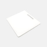 White divider supplied with the Orbie 55 cool box, with a cut-out handle, doubling as a chopping board