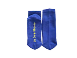 Pair of royal blue merino crew socks laid flat showing the ribbed leg and sole