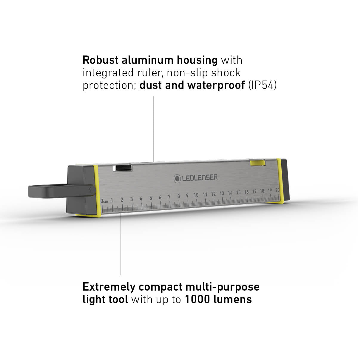 Ledlenser AF2R Work lying on its side, showing the brushed aluminium housing with 20cm ruler, rated IP54