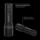 Ledlenser P7 infographic showing the end cap switch and four AAA batteries