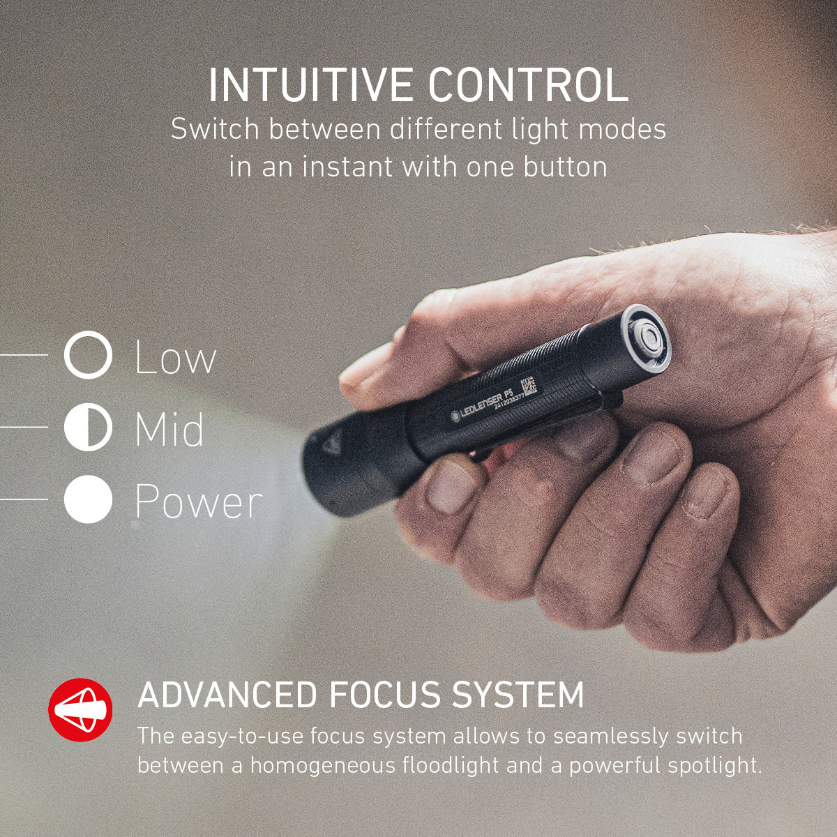 Hand holding the Ledlenser P5, with its one button control and focus system