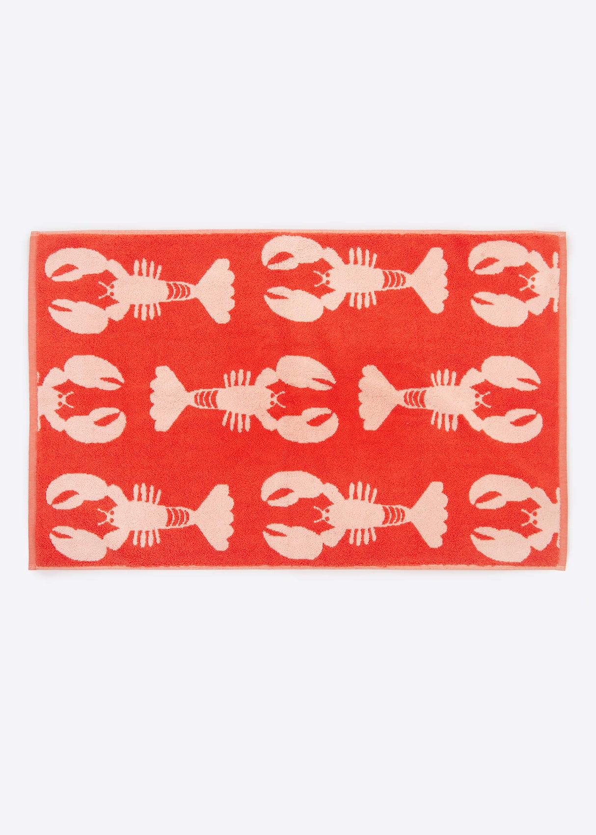 Anorak Lobsters Organic Cotton Towel - Coral and pink bath mat flat lay