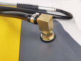 Brass outlet fitting and hose clip at the base of the Bush Fire Aqua Backpack