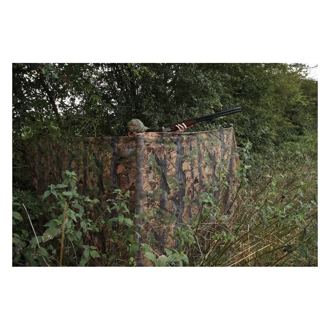 Jack Pyke Clearview Hide Net - English Oak Evo deployed as a field hide