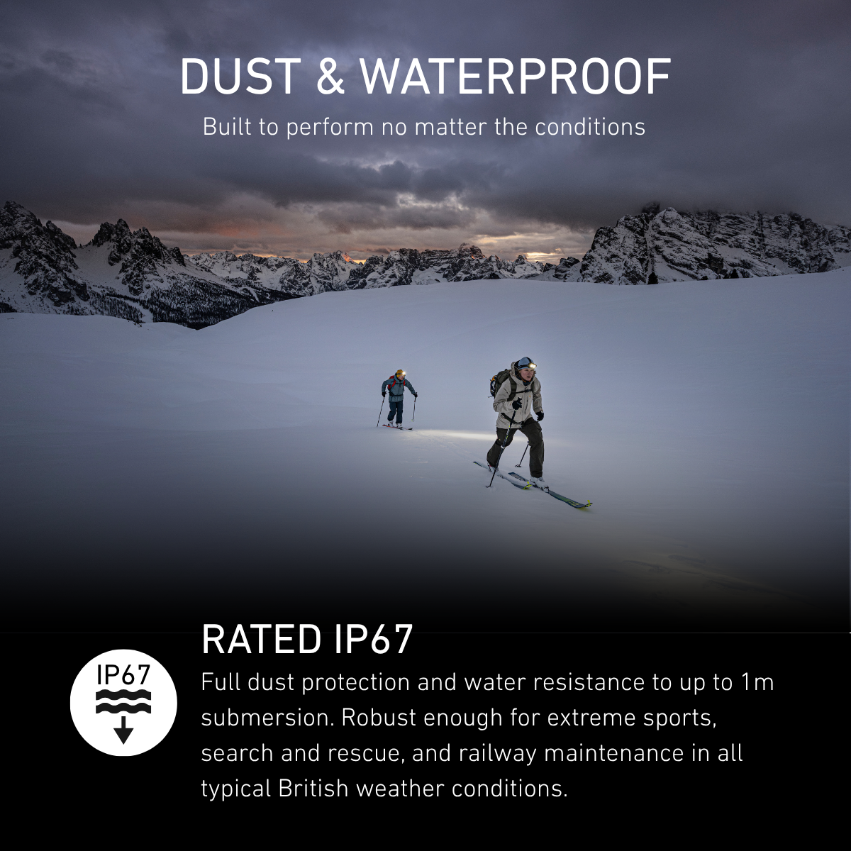 Two ski tourers crossing snow at dusk under a head torch beam, rated IP67 dust and waterproof