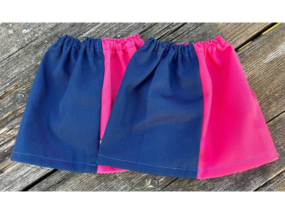 Pair of navy and pink harlequin sox savers laid flat on wooden boards
