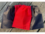 Pair of black and red harlequin sox savers laid flat showing the elasticated tops