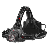 Ledlenser H14R.2 head torch with focusing lamp head, top strap and rear battery box on a grey and black headband