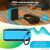 Maplin speaker IPX6 graphic on a picnic blanket beside headphones