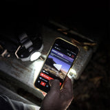 Ledlenser app on a phone showing Energy Saving mode beside the MH11 head torch