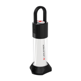 Ledlenser ML6 rechargeable camping lantern on its rubber stand, angled view