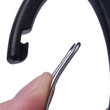 Close-up of the wire-gate carabiner opening on a shears handle