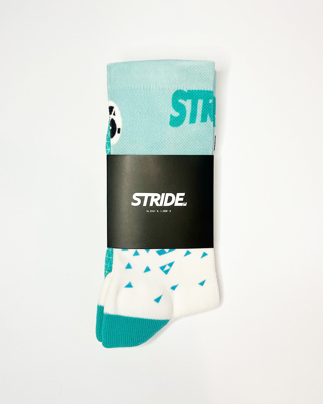 Stride Jade Force running sock folded in its black STRIDE card sleeve